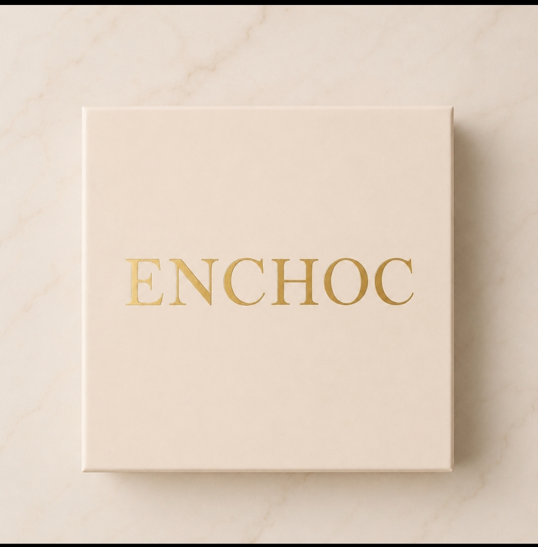 EnChoc gold-embossed signature gift box on marble